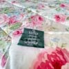 Close-up of Ralph Lauren tag sewn into side seam of Water Floral Pink vintage king comforter