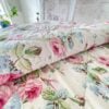 Vintage Ralph Lauren Water Floral Pink comforter folded back, showing warm and cozy layers