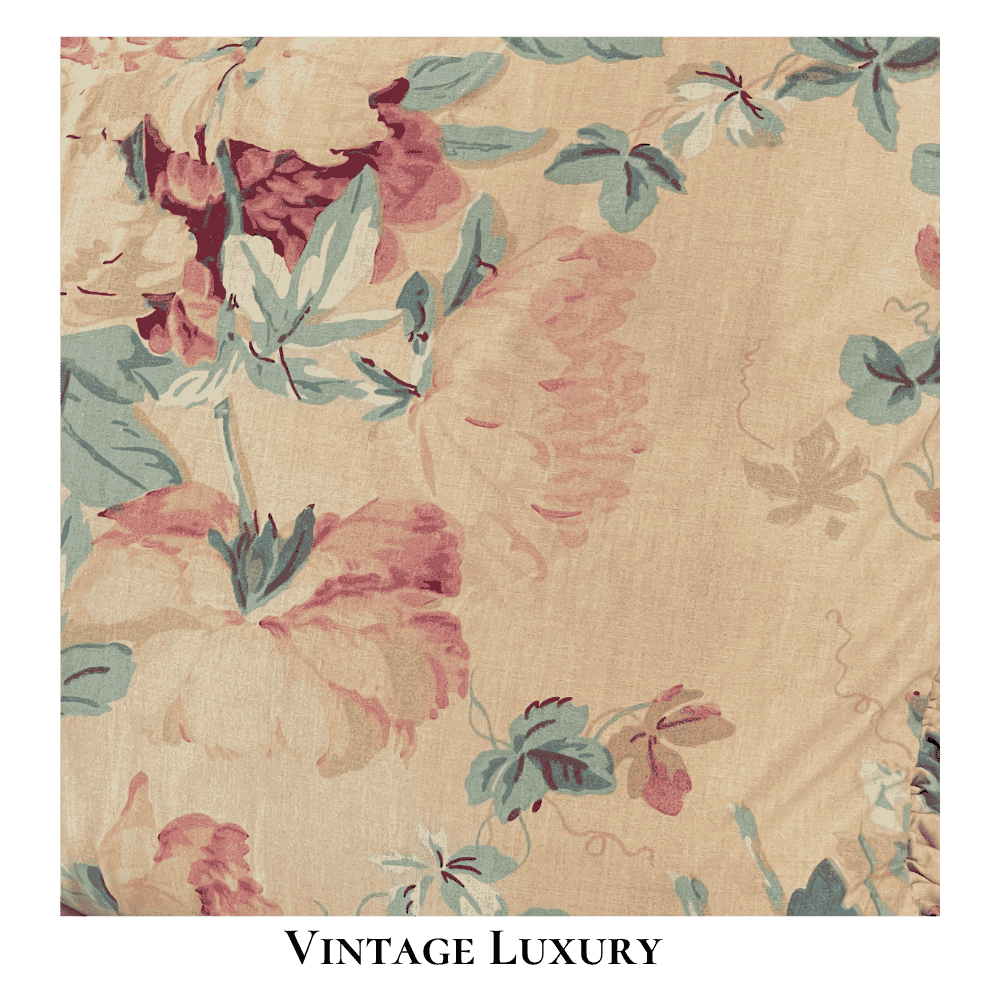 Top-down view of the Ralph Lauren Elsa Grassland ruffled shams showing the gold background with pink and red peonies, gold wildflowers, and soft green foliage.