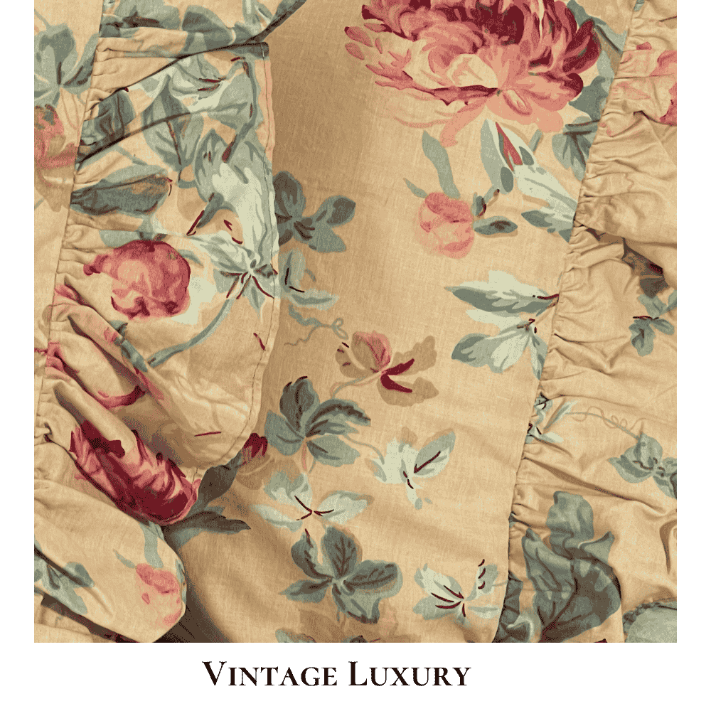 Top-down close-up of the Ralph Lauren Elsa Grassland ruffled shams showing the soft gathered ruffle edge and the gold floral pattern with pink and red peonies.