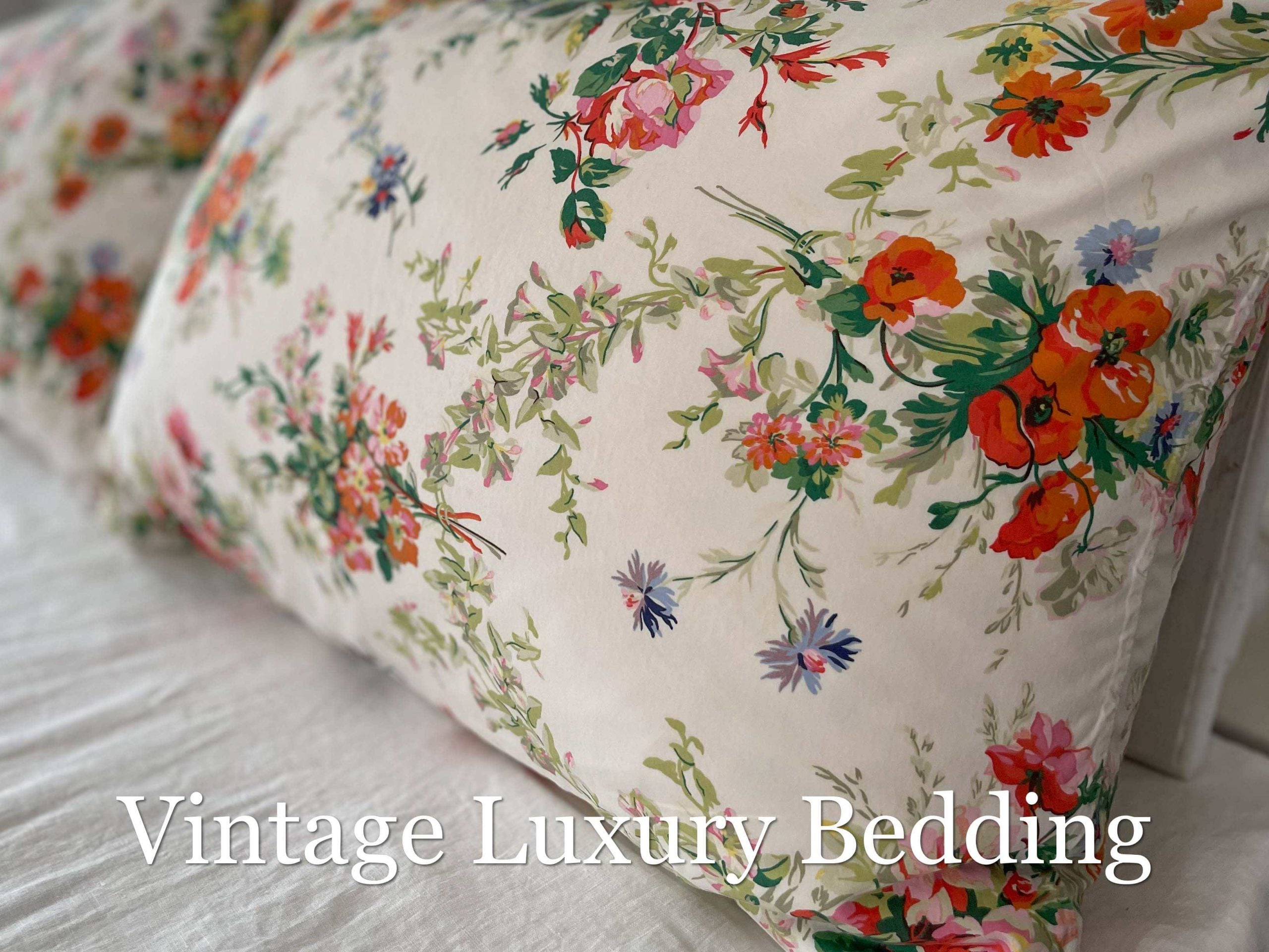 Side view of the Ralph Lauren Belle Harbor king pillowcases with pillows inside, showing the bright floral print with peonies and multicolor wildflowers.