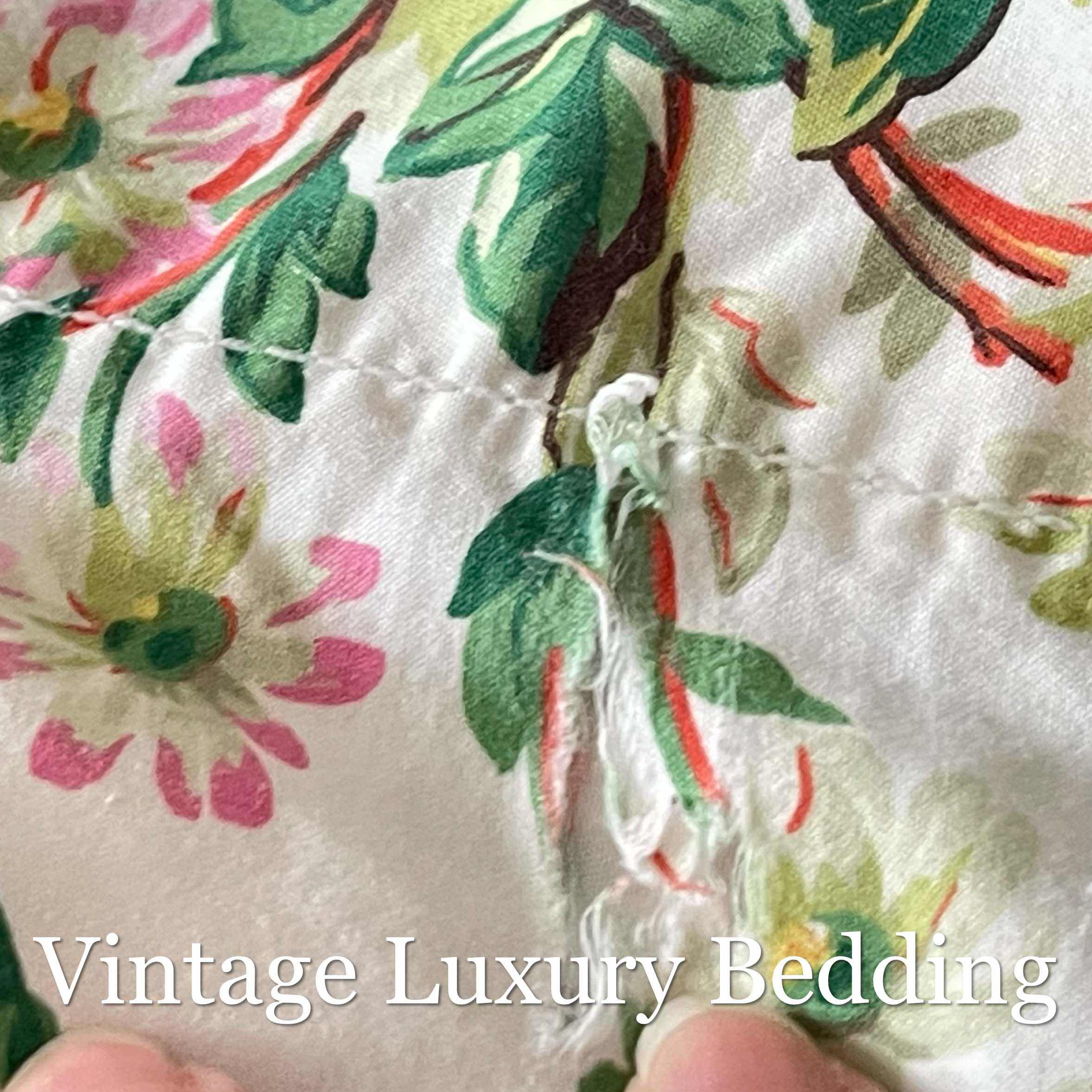 Top-down close-up of a small fraying area on the Ralph Lauren Belle Harbor king flat sheet.