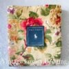 Ralph Lauren Constance queen flat sheet neatly folded with placard visible from top-down view.