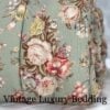 Side view of Ralph Lauren Charlotte comforter rolled up, highlighting floral pattern