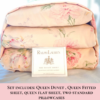 Front view of neatly stacked vintage Ralph Lauren Therese Queen bedding set