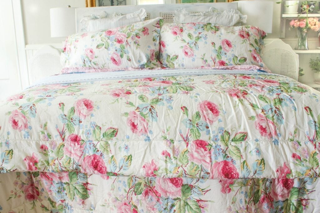 Full King bed made with vintage Ralph Lauren Water Floral Pink comforter, pillows, and sheets