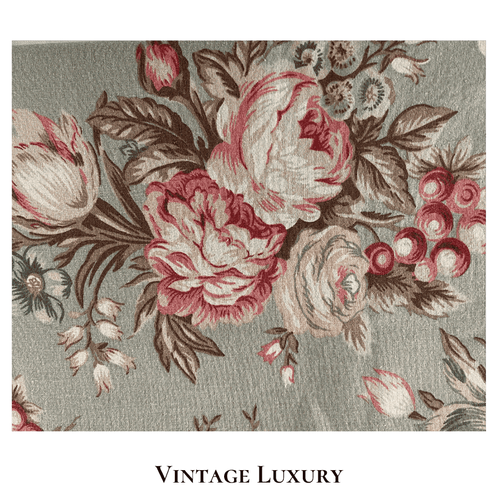 Super tight close-up of the floral pattern on the rare retired Ralph Lauren Charlotte pillowcase from the Ralph Lauren Home line, showing light red ranunculus, roses, peonies, and multicolored wildflowers on a sage green background.