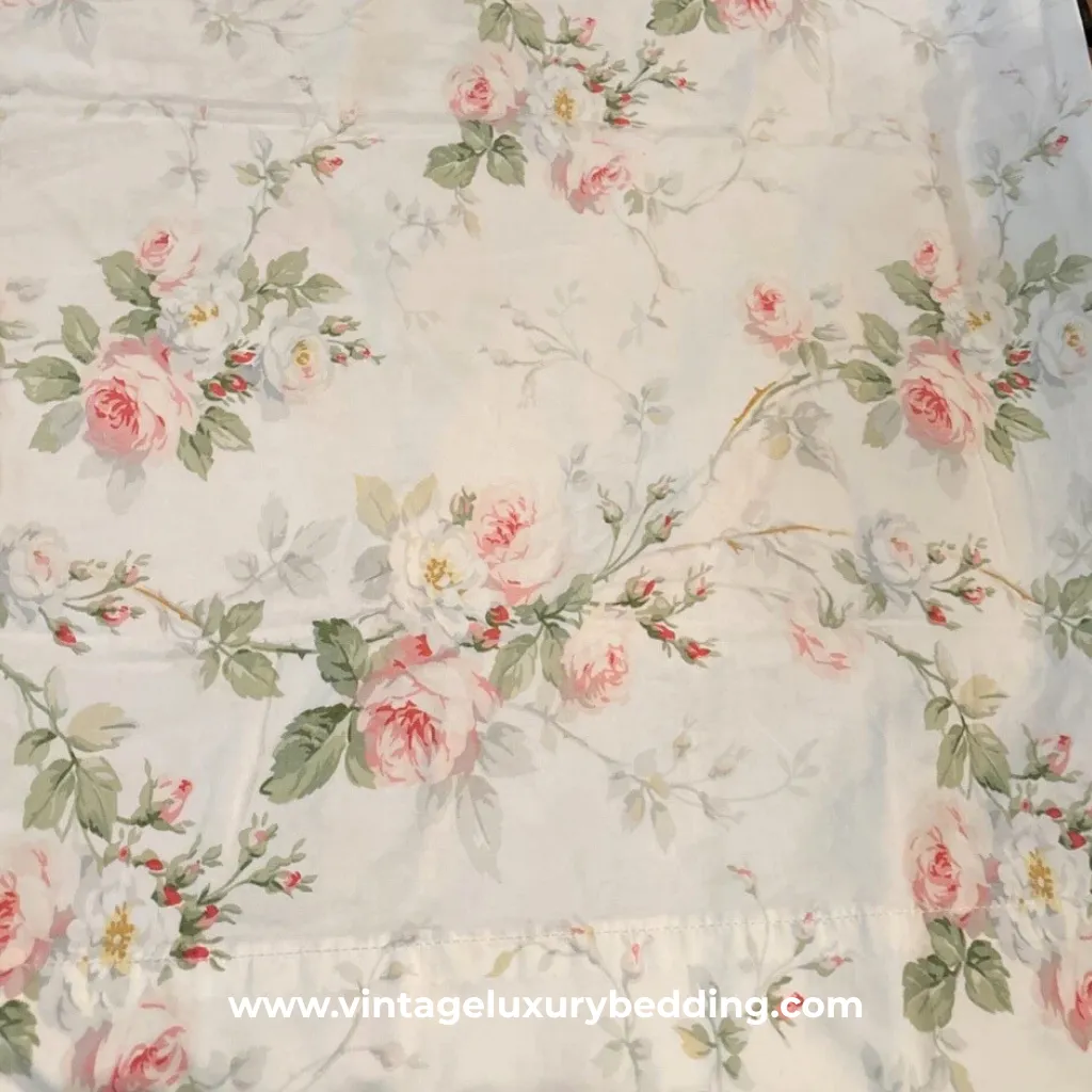 The Felicia pattern by Ralph Lauren captures the spirit of English garden florals with a touch of vintage whimsy. This discontinued bedding design features loosely arranged blooms in warm pastels, creating a soft, painterly feel. Perfect for layering in romantic or cottage-inspired bedrooms, Felicia remains a sought-after treasure among vintage Ralph Lauren collectors