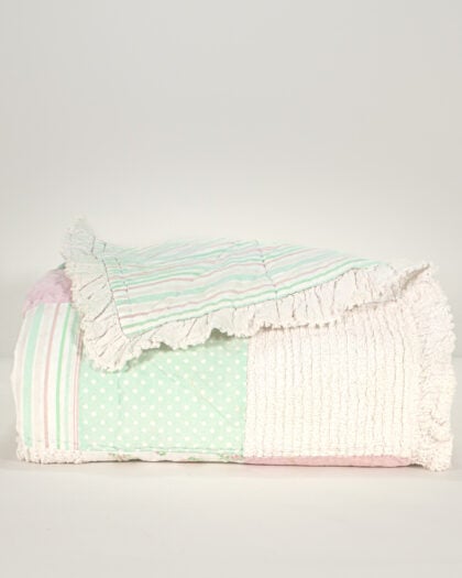 Simply Shabby Chic patchwork chenille twin kids quilt nearly folded showing chenille front and striped reverse