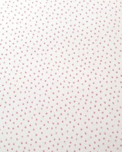 Close-up top-down detail of the Simply Shabby Chic Target-era Candy Cane Floral pattern on pink cotton fabric