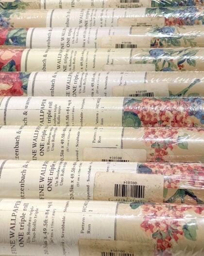 multiple Katzenbach and Warren floral wallpaper rolls grouped together same dye lot