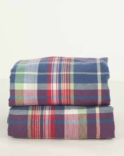 Pair of folded Ralph Lauren Garrison Madras standard shams in multicolor plaid cotton