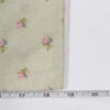 Simply Shabby Chic sage ditsy floral pillowcase shown with measuring tape indicating 19 inch width