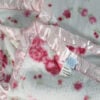 Simply Shabby Chic pink plush blanket top down showing satin trim edging floral cabbage rose pattern Target era