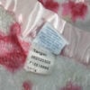 Simply Shabby Chic pink plush blanket care tag Target Q2 2014 machine wash instructions closeup