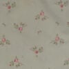 Medium close-up of pink rose sprig floral print on muted sage green Simply Shabby Chic pillowcase