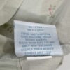 Care tag on Simply Shabby Chic pillowcase showing fabric content and washing instructions