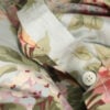 Folded edge of Ralph Lauren Stone Harbor duvet showing floral cotton sateen fabric with buttons