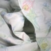 Yves Delorme Luxembourg Palais Royal Floral duvet cover button closure close-up