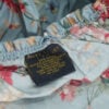 Ralph Lauren Home label on Yvette Floral Blue fitted sheet close-up
